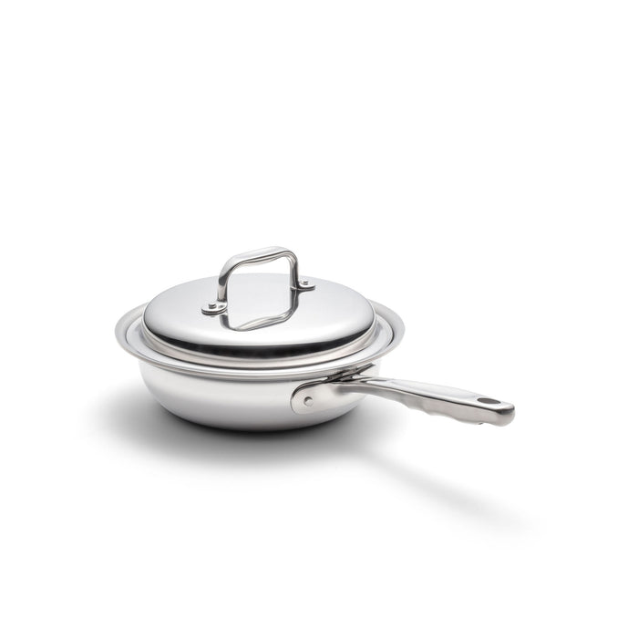 Angled view of 1.5 Quart Sauté with Cover showcasing stainless-steel body and long ergonomic handle on white background