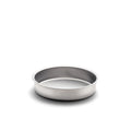 Three quarter view of 9 inch round cake pan showcasing stainless steel construction and no handles on white background