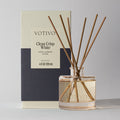 The Votivo Clean Crisp White Reed Diffuser fills your space with continuous scents of ozone, cyclamen, and musk. Light-colored liquid and slender reeds are housed in a sleek vessel and box for an elegant aromatic experience.
