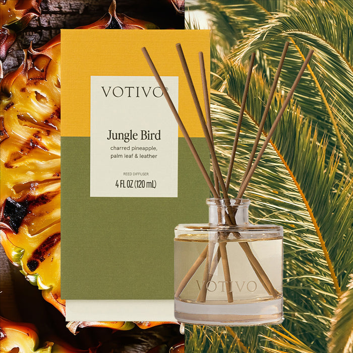 The Votivo Jungle Bird Reed Diffuser features five fiber reeds in a glass bottle and vibrant yellow-green packaging. Enjoy continuous fragrance with notes of pineapple and palm leaves.