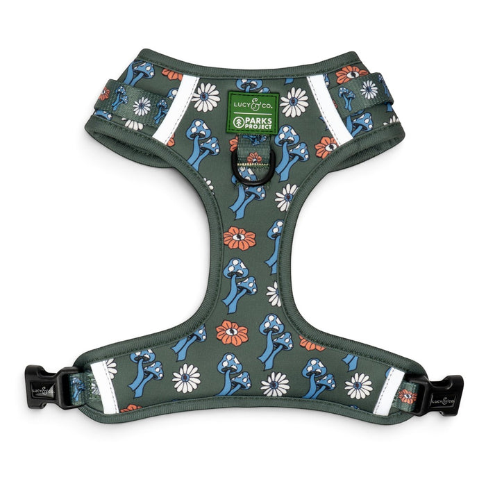 Lucy & Co. x Parks Project no-pull dog harness in olive green with a mushroom and daisy print and reflective trim.