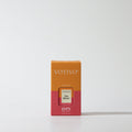 The Votivo Pink Mimosa Pura + Votivo Fragrance Refill Vial, made for Smart Fragrance Diffusers and the Pura app, comes in packaging with orange and pink blocks and white text, displayed on a white background.