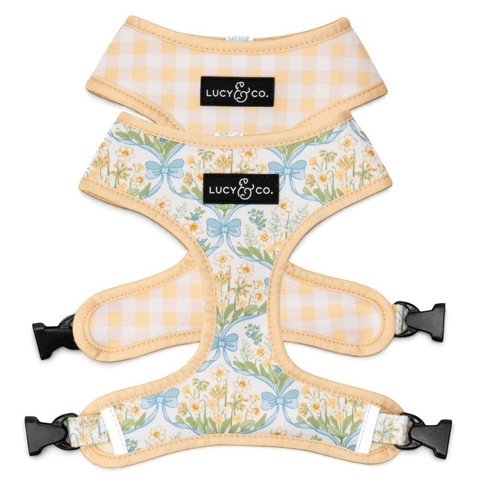 Lucy & Co. reversible dog harness with floral print on one side and yellow gingham on the other, made of neoprene.