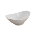 Oval white ceramic serving bowl with a slanted, asymmetrical rim.